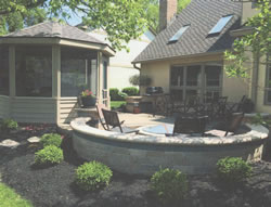 The gazebo on the left next to the Flagstone Patio and Fire Pit from a different angle