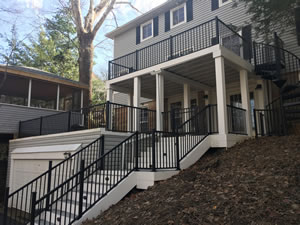 An after photo of the backyard with the aluminum fence